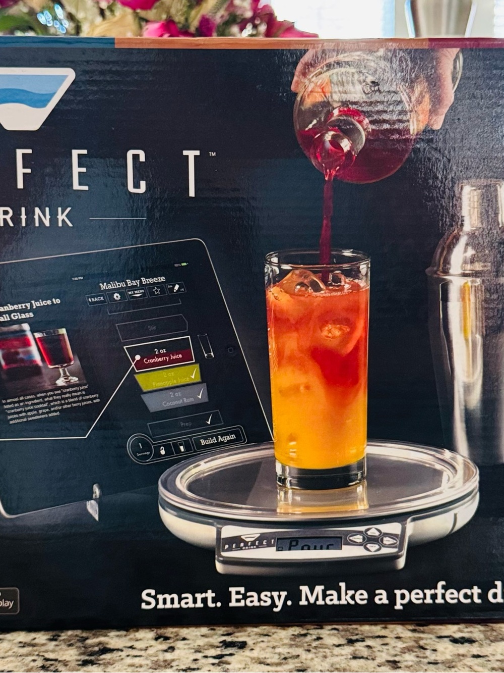 Brookstone Smart Drink Mixer Display Box with Orange and Red Drink Image